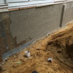 Foundation in the process of being repaired.